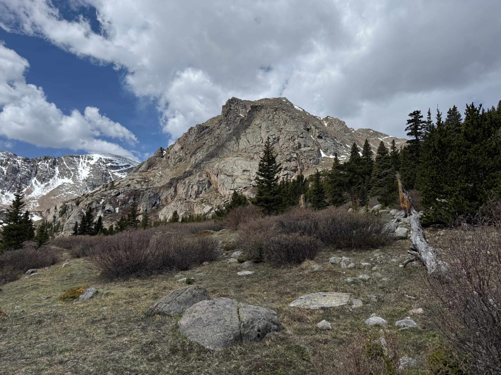 Rugged rocky cliffs as viewed from the Chicago Lakes trail in Mt Blue Sky Wilderness