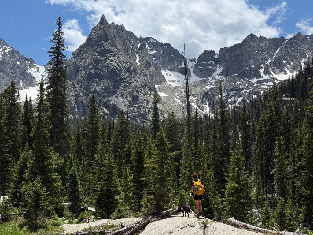 Hiker on the way to Crater Lake in Indian Peaks Wilderness