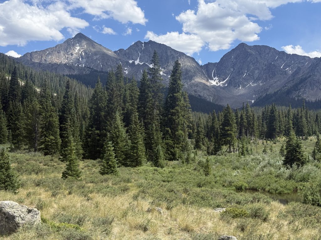 The Three Apostles dominate the skyline early on when hiking the Lake Ann Trail.